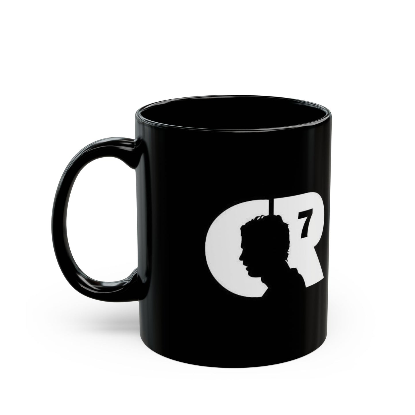 Black mug with white silhouette and 'CR7' logo on a white background