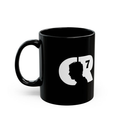 Black mug with white silhouette and 'CR7' logo on a white background